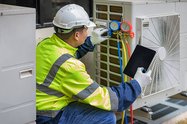 Professional Hvac technician working in North Pembroke, MA